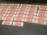 У подозреваемых изъяли билеты банка приколов.