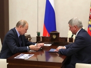 Владимир Путин и Александр Гусев.