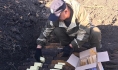 Подготовка к подрыву боеприпасов.