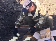 Подготовка к подрыву боеприпасов.