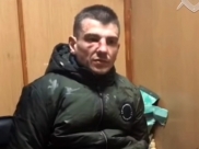 Задержанный во время допроса.