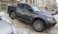 Машинам на платной парковке грозят сосульки.