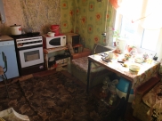 Убийство произошло на этой кухне.