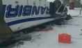 Автобус упал с моста на лед реки.