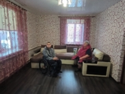 В новой квартире.