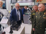 На выставке.